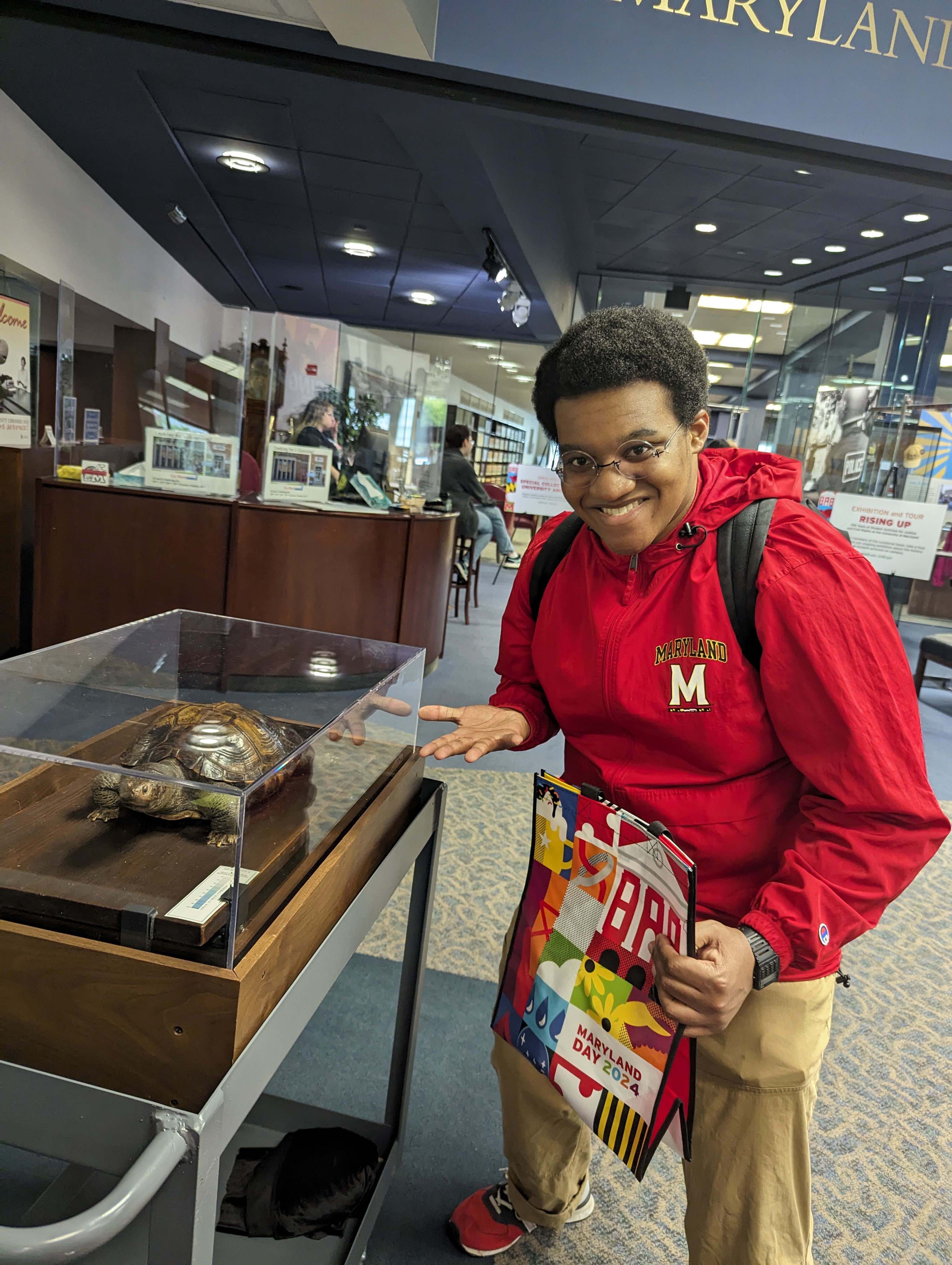 This is a picture of Aaron with a taxidermied turtle